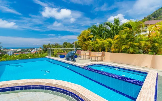 Infinity swimming pool with sea views over Kata Beach