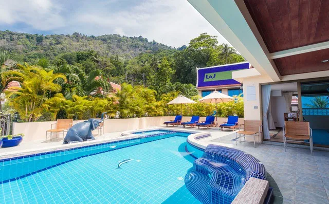 Poolside relaxation area with outdoor seating